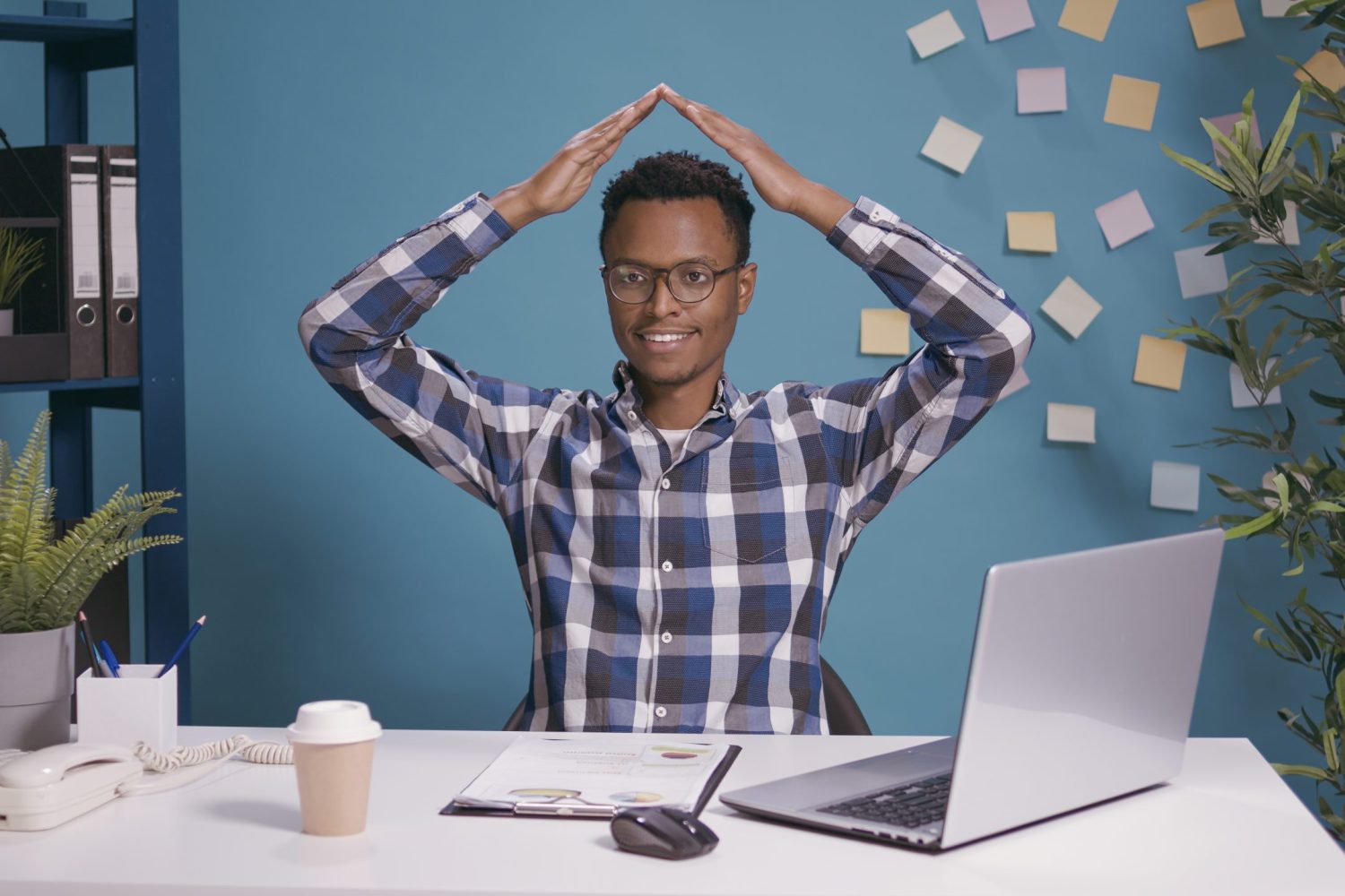 company-employee-doing-house-roof-gesture-with-arms-feeling-safe-secure-inside-man-feeling-protected-advertising-safety-symbol-wishing-home-protection-life-insurance-scaled.jpg